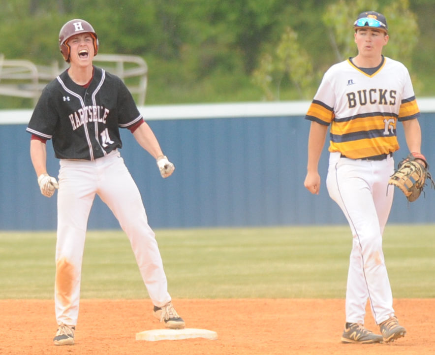 Hartselle's Peyton Steele celebrates after hitting an RBI double in the sixth inning to put the Tigers up over Buckhorn 4-3.JPG